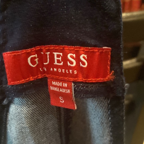New with tags. Denim guess overall romper - Picture 2 of 3
